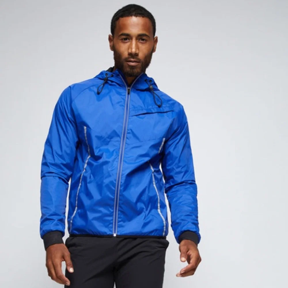 NWT Fourlaps Propel Windbreaker Cobalt Blue Small